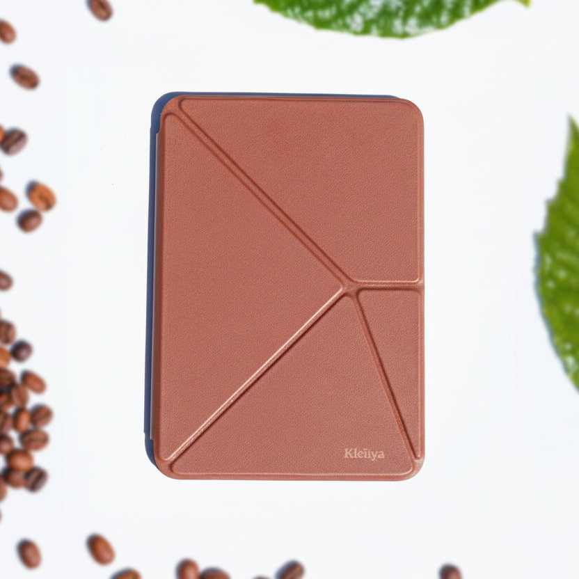 Brown geometric tablet case with 'Kleiiya' branding on a white background with coffee beans and leaves.